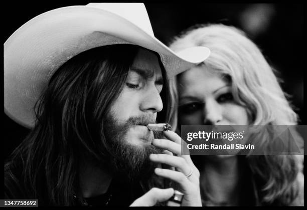 Singer/songwriter Chris Robinson and actress/model Lala Sloatman are photographed in 2006 in Laurel Canyon, California. Published in Randall Slavin's...