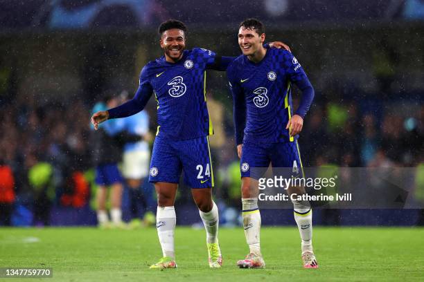 Reece James of Chelsea celebrates with teammate Andreas Christensen at full-time after the UEFA Champions League group H match between Chelsea FC and...