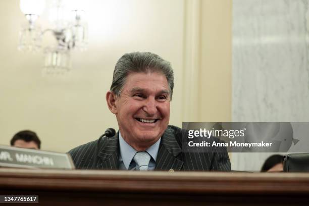 Sen. Joe Manchin listens during a business meeting with the Senate Committee on Veteran Affairs on Capitol Hill on October 20, 2021 in Washington,...