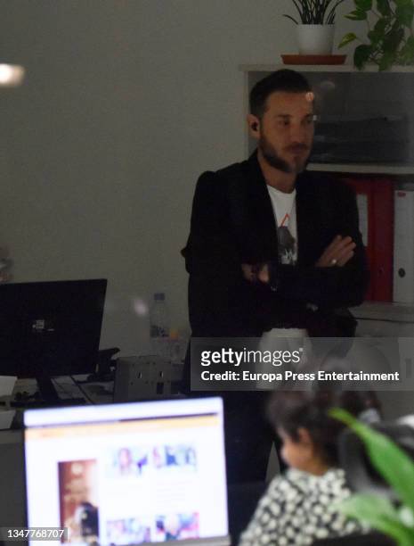 Antonio David Flores in the office of his lawyer, Ivan Hernandez, as a worker views the website of the TV show 'Salvame', on October 20 in Madrid,...