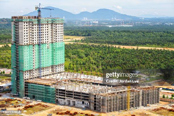 new building being constructed - palm oil production stock pictures, royalty-free photos & images