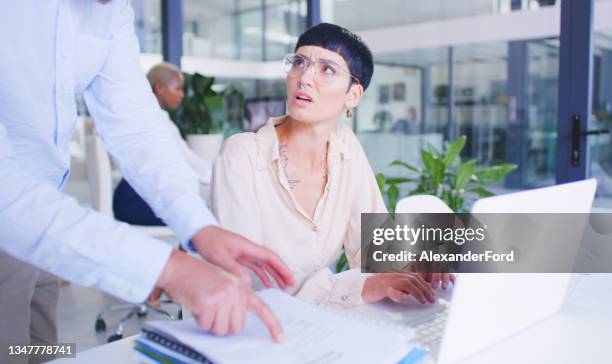 shot of a young businesswoman being handed a pile of paperwork in a modern office - delegating stock pictures, royalty-free photos & images