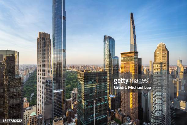 high angle sunset view of billionaires' row in new york - midtown manhattan aerial stock pictures, royalty-free photos & images