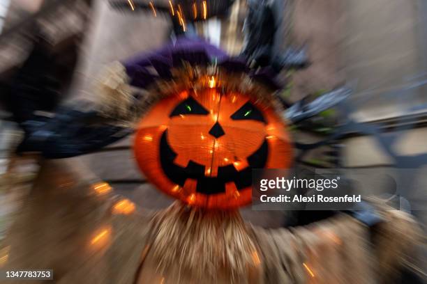 Jack-o-lantern scarecrow is displayed at an Upper West Side home is decorated for Halloween on October 20, 2021 in New York City. Many Halloween...