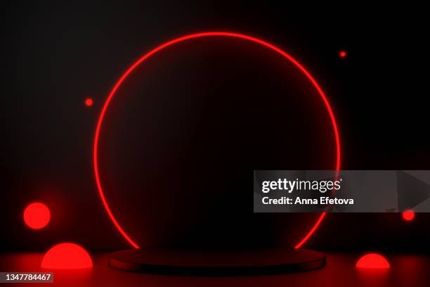 luxury round black podium with red backlight on black background with many illuminated red spheres. perfect platform for showing your beauty products. three dimensional illustration - rodada da competição - fotografias e filmes do acervo