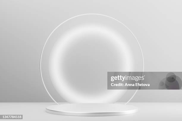 luxury round silver podium with white backlighting on white background. perfect platform for showing your products. three dimensional illustration - pódio de conferencista imagens e fotografias de stock