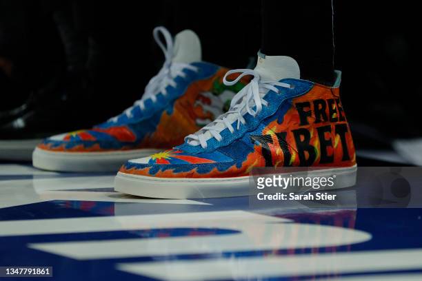 Detail of the shoes worn by Enes Kanter of the Boston Celtics with the wording "Free Tibet" during the first half against the New York Knicks at...