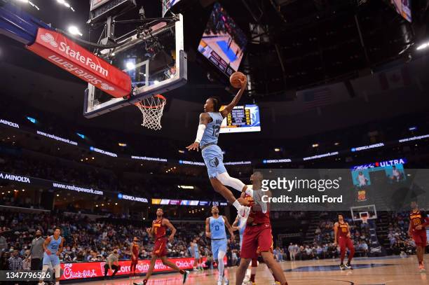 Ja Morant of the Memphis Grizzlies dunks against the Cleveland Cavaliers during the third quarter at FedExForum on October 20, 2021 in Memphis,...