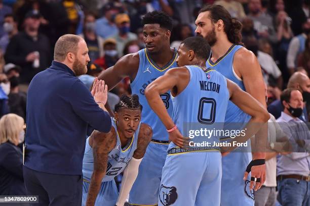 Head coach Taylor Jenkins of the Memphis Grizzlies talks to his team during the game against the Cleveland Cavaliers at FedExForum on October 20,...