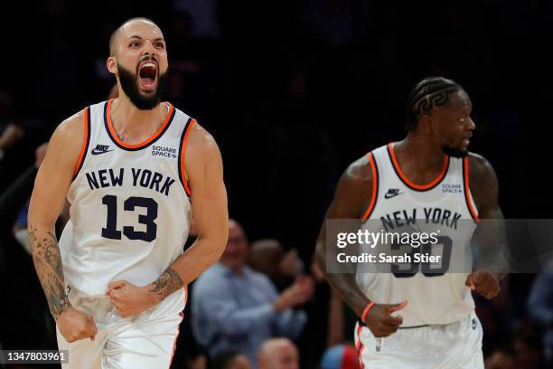 Evan Fournier of the New York Knicks reacts after making a three-point basket during second overtime against the Boston Celtics at Madison Square...
