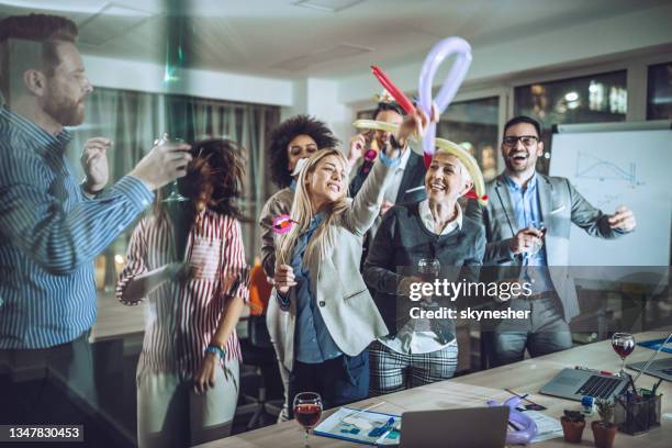dancing at office party! - office party stock pictures, royalty-free photos & images