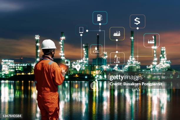 engineer using digital tablet - night icon stock pictures, royalty-free photos & images