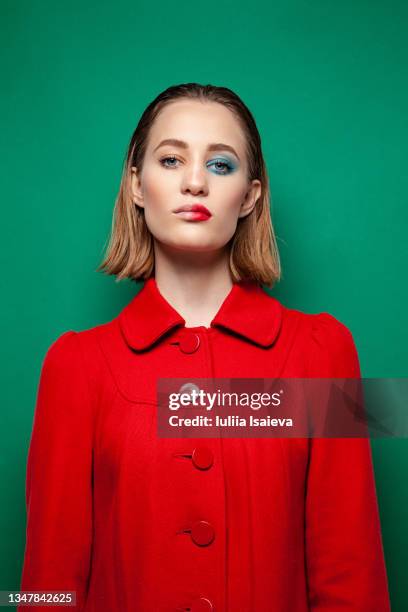 woman with makeup on half of face - halved stock pictures, royalty-free photos & images