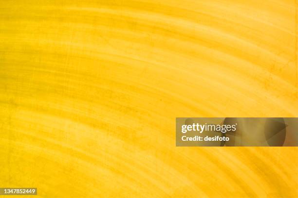 bright mustard yellow color grunge effect horizontal vector background with curved strokes all over - solid colour background stock illustrations