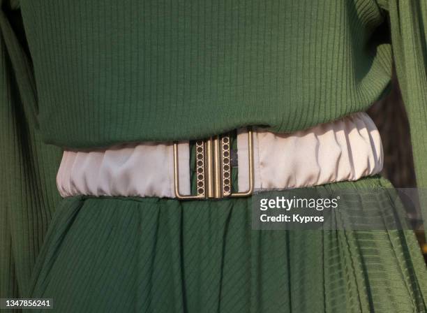 woman wearing belt with dress - leather belt fotografías e imágenes de stock