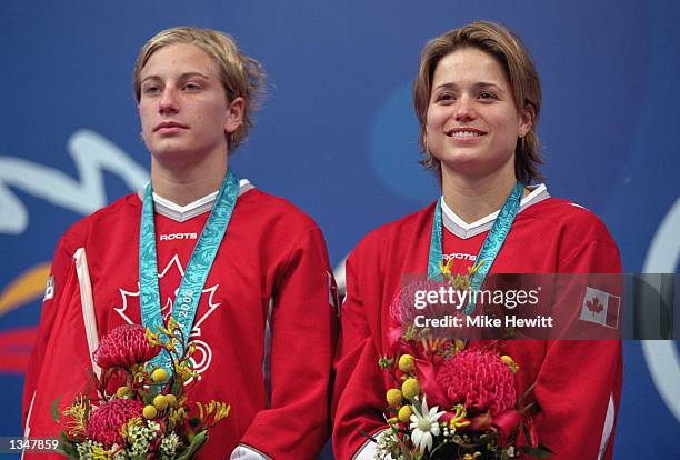 Emile Heymans and Anne Montminy of Canada receive a Silver medal in the Women's Synchronize 10m Final during the Sydney 2000 Olympic Games on...