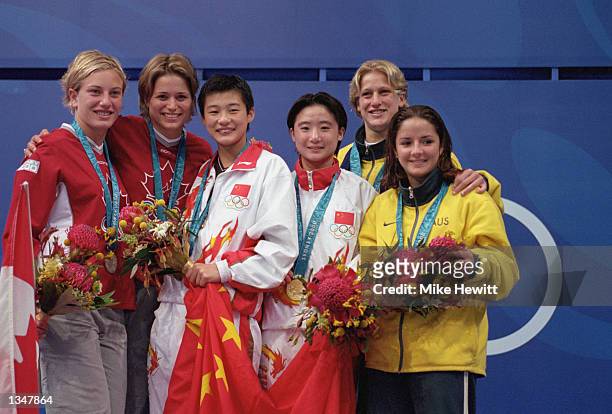 Silver medalist Emile Heymans; Anne Montminy of Canada pose with Gold medalist Li Na; Sang Xue of China and Bronze medalist Rebecca Gilmore; Loudy...