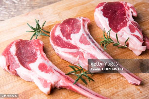 raw lamb chops with rosemary - lamb chop stock pictures, royalty-free photos & images