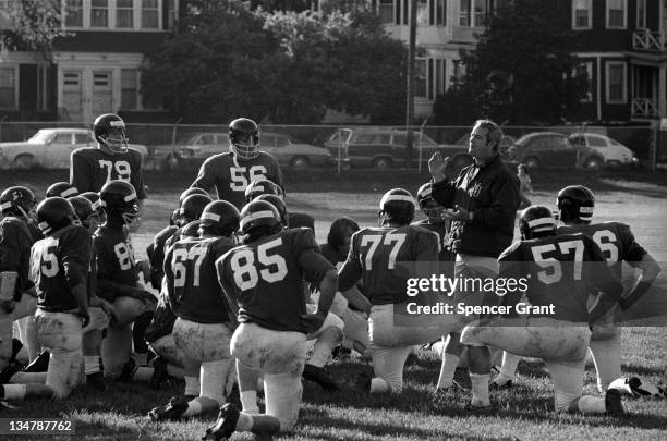 Northeastern University football team and coach, Boston, Massachusetts, 1970s.