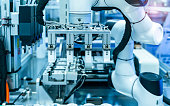 robotic pneumatic piston sucker unit on industrial machine
