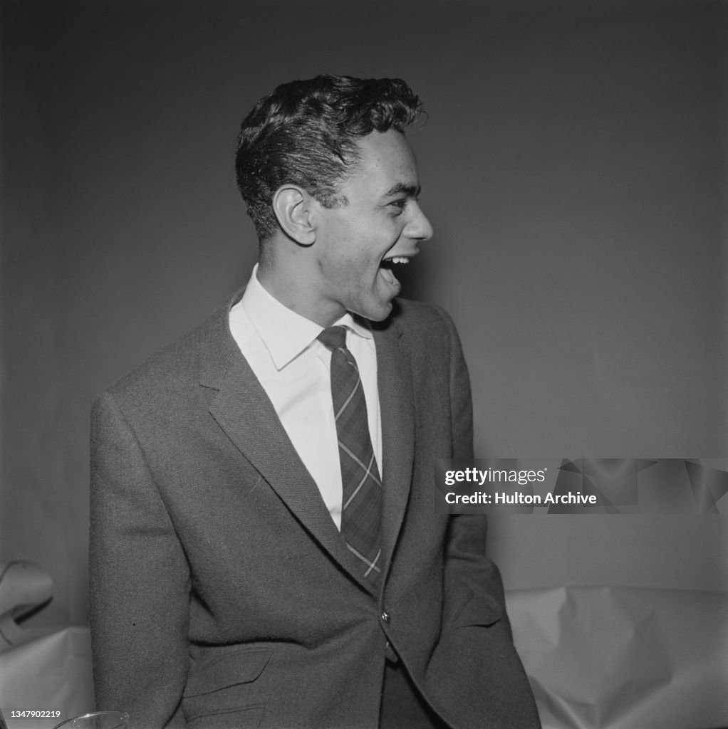 American singer Johnny Mathis at a music studio, circa 1957. He is at ...