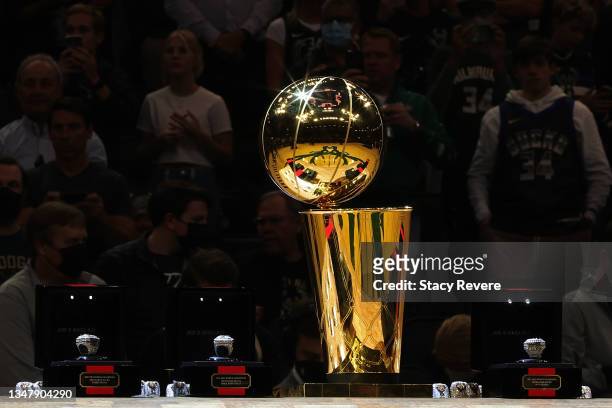 Detailed view of the Larry O'Brien Championship Trophy and the 2021 NBA Championship rings prior to a game between the Milwaukee Bucks and the...