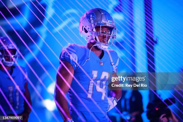 Amon-Ra St. Brown of the Detroit Lions looks on before the game against the Cincinnati Bengals at Ford Field on October 17, 2021 in Detroit, Michigan.