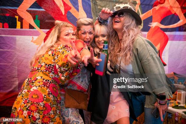 friends singing & dancing - festival of remembrance stock pictures, royalty-free photos & images