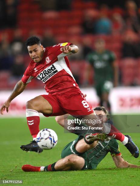 Middlesbrough player Onel Hernandez is fouled by Jasper Moon of Barnsley during the Sky Bet Championship match between Middlesbrough and Barnsley at...