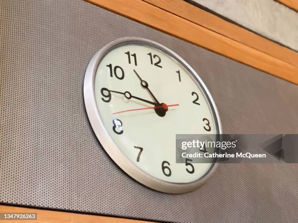 old-fashioned traditional wall clock - analog stock pictures, royalty-free photos & images