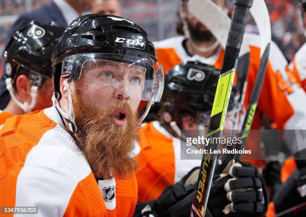 Ryan Ellis of the Philadelphia Flyers looks on from the bench against the Vancouver Canucks at the Wells Fargo Center on October 15, 2021 in...