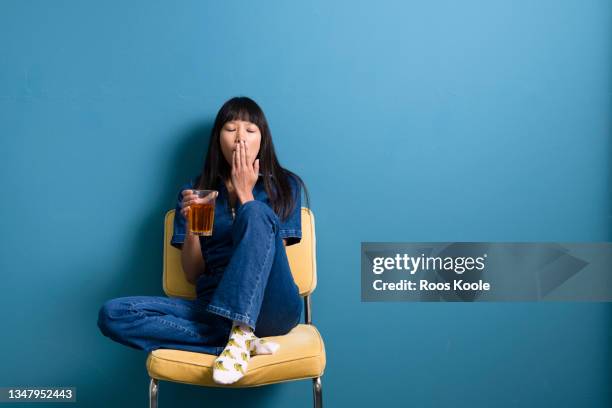 portrait of a woman - asian woman drinking tea stock pictures, royalty-free photos & images