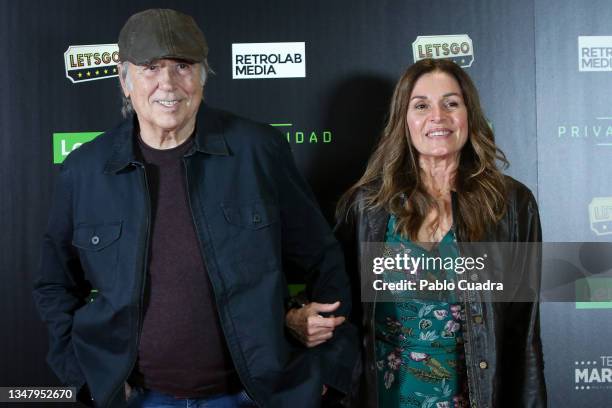 Singer Joan Manuel Serrat and wife Candela Tiffon attend the 'Privacidad' premiere at the Marquina theatre on October 21, 2021 in Madrid, Spain.