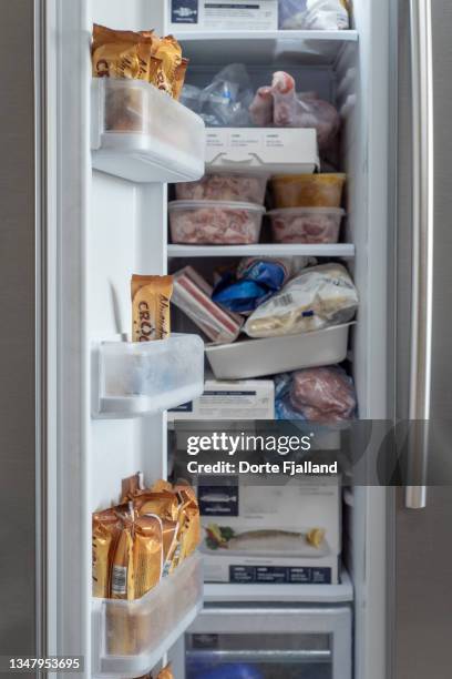 a look into a very full freezer - full stock pictures, royalty-free photos & images