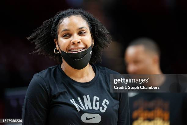 Assistant coach Lindsey Harding of the Sacramento Kings looks on before the game against the Portland Trail Blazers at Moda Center on October 20,...