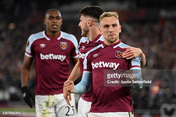 Jarrod Bowen of West Ham United celebrates with team mate Declan Rice after scoring their sides third goal during the UEFA Europa League group H...