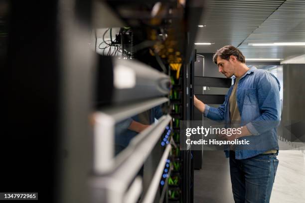 it support technician fixing a network server - control room stock pictures, royalty-free photos & images