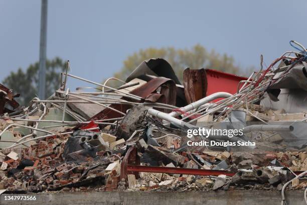 debris from a collapse building - rubble explosion stock pictures, royalty-free photos & images