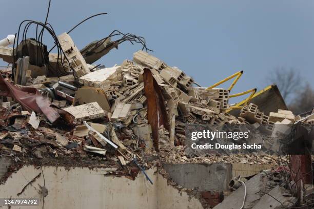 crumbling building being destroyed - demolish stock pictures, royalty-free photos & images