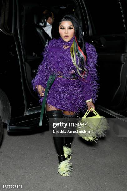 Lil' Kim arrives at the Bottega Veneta Salon 03 Presentation at Michigan Theater on October 21, 2021 in Detroit, Michigan.