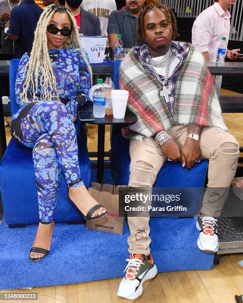 Chloe Bailey and Gunna attend Atlanta Hawks vs Dallas Mavericks home opener game at State Farm Arena on October 21, 2021 in Atlanta, Georgia.