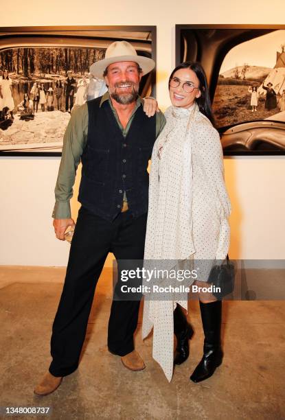 Biran Bowen Smith and Demi Moore attend Casa Del Sol Tequila Presents Drivebys By Brian Bowen Smith on October 21, 2021 in Los Angeles, California.