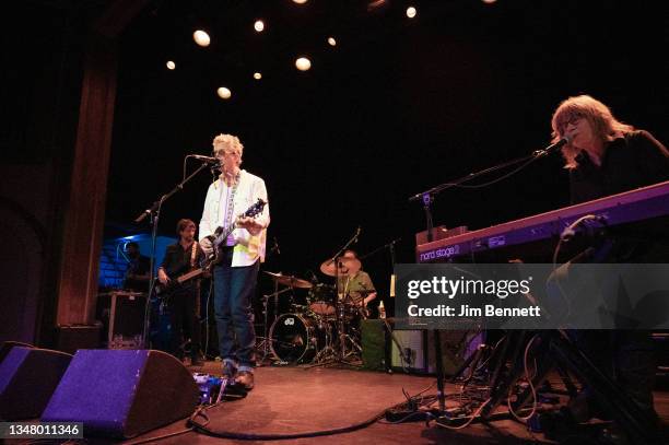 Bassist Marc Perlman , singer, songwriter and guitarist Gary Louris and keyboardist and singer Karen Grotberg of The Jayhawks perform live on stage...