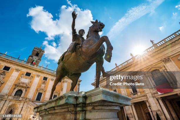 the statue of emperor marcus aurelius dominates the campidoglio or roman capitol in the heart of rome - capitol rome stock pictures, royalty-free photos & images