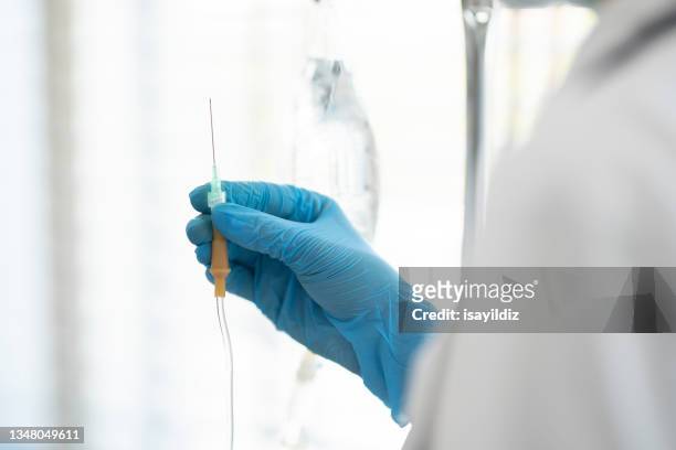 heart shape with doctor - catheter stock pictures, royalty-free photos & images