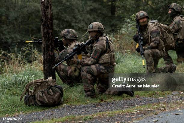 Soldiers from the 2nd regiment of Foreign Legion infantry secure the surroundings of the city before their assault during the 2021 Baccarat training...