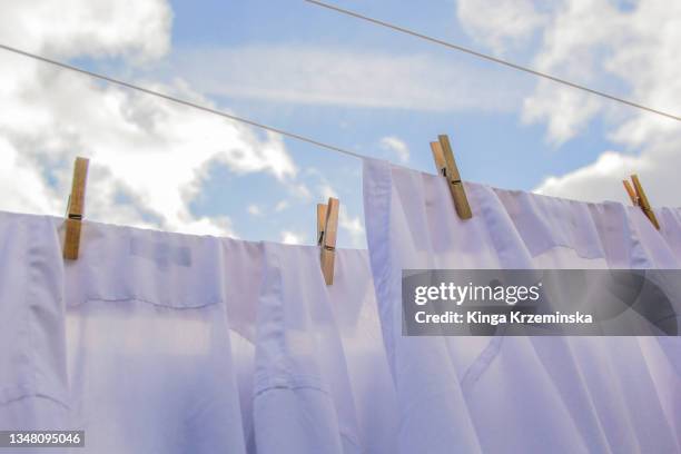 laundry outdoors - trocknen stock-fotos und bilder