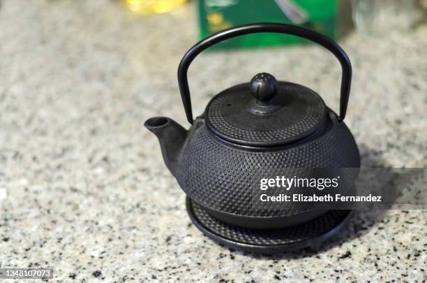 cast iron japanese teapot with hobnail pattern - ティーポット ストックフォトと画像