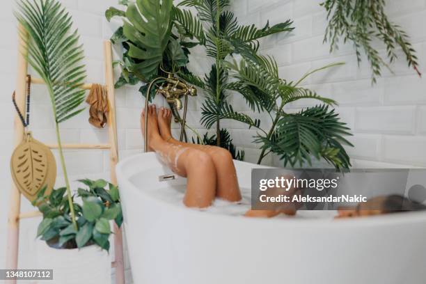 relaxing bath - bathroom exercise stock pictures, royalty-free photos & images