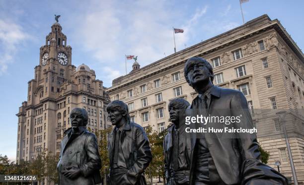 View of the Beatles statue which is located on the waterfront in front of the Liver Buildings on October 22, 2021 in Liverpool, United Kingdom. He...